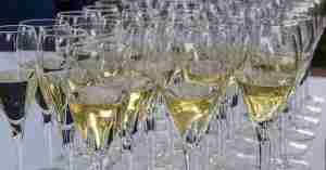 A collection of wine glasses with prosecco