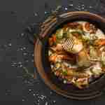 A top view image of crockpot with a dish that follows gluten-free crockpot chicken recipes