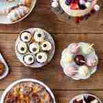 Selection of gluten-free desserts on a woody table