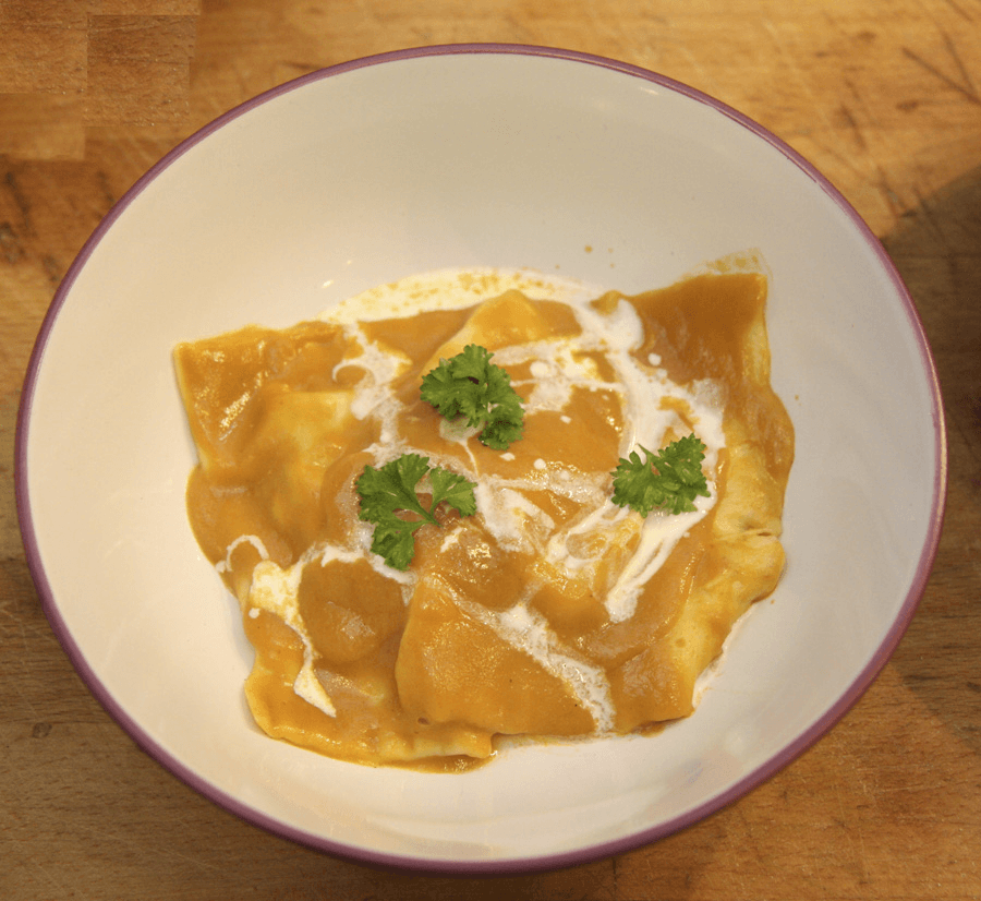 A bowl of gluten-free crab ravioli