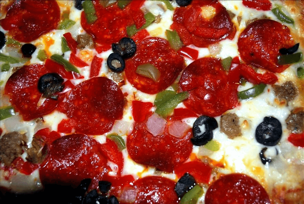 A close-up image of gluten-free pizza toppings