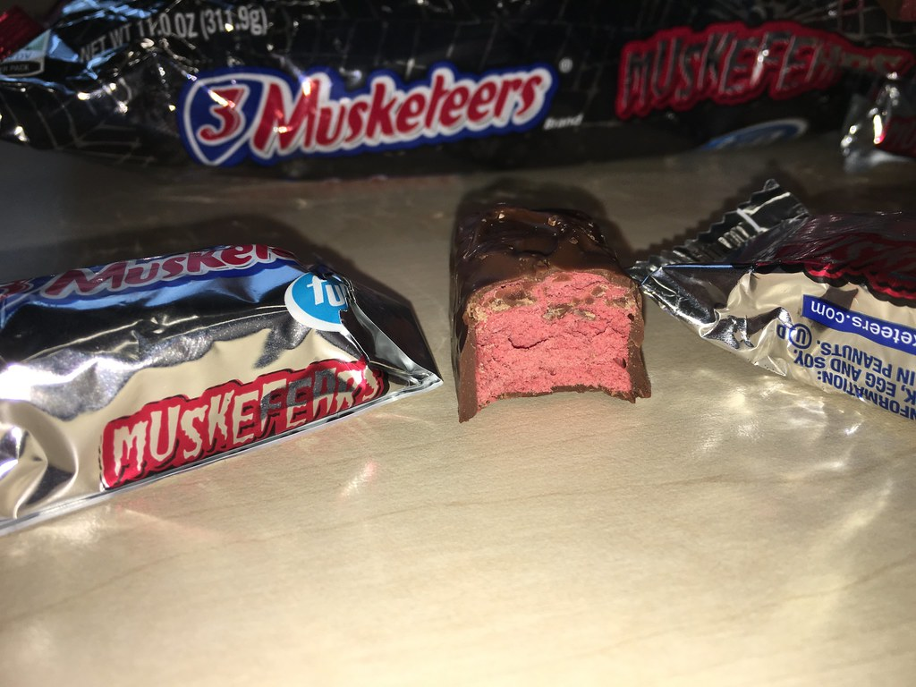 An image of bitten 3 Musketeers Chocolate bar