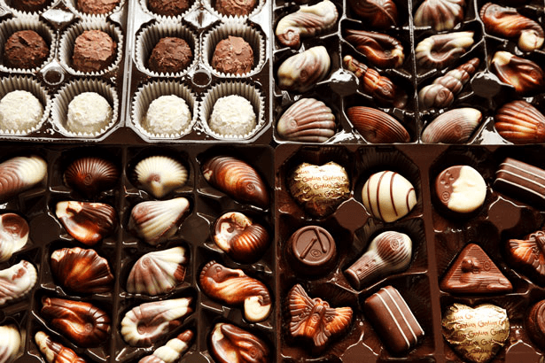 A selection of bite-sized chocolates in a box