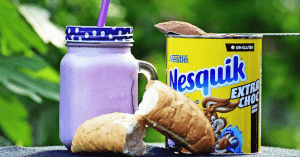 Is Nesquik Gluten-Free? An image of Nesquik can with bread and cup