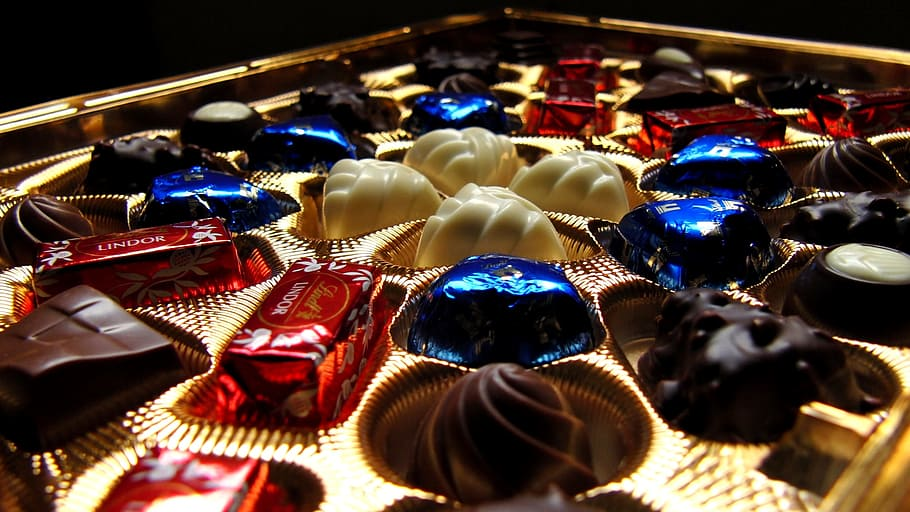 An image of Lindt bite-sized chocolates on a luxurious box