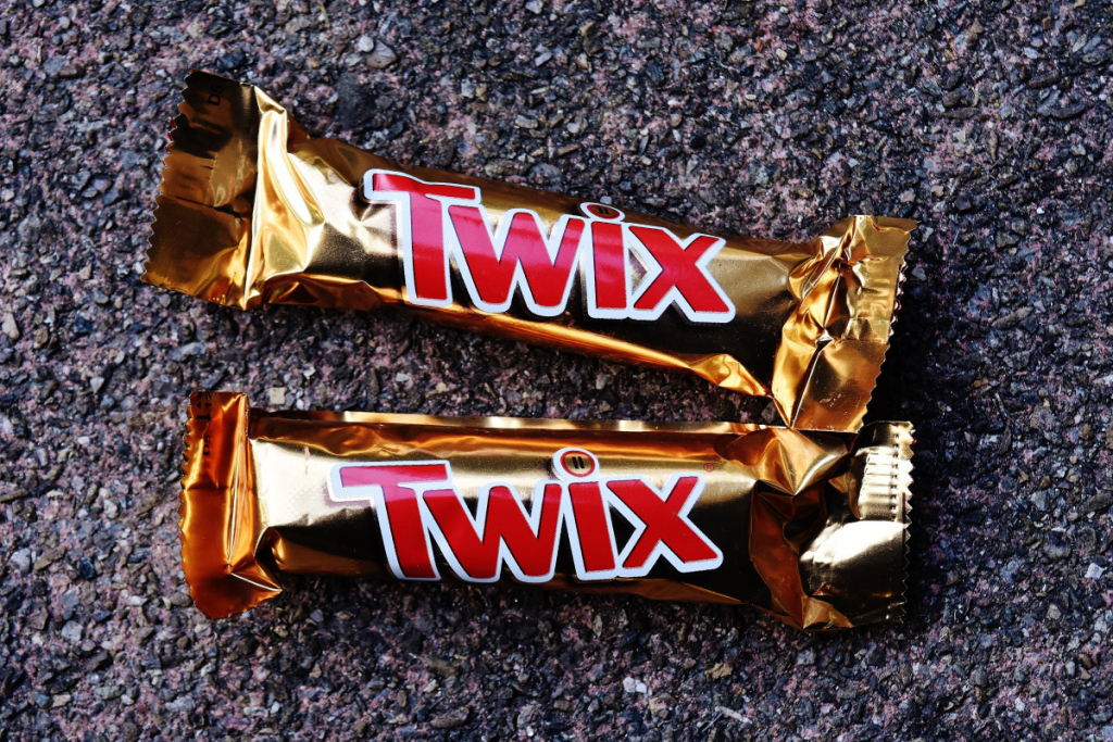 An image of two wrapped Twix chocolate bars