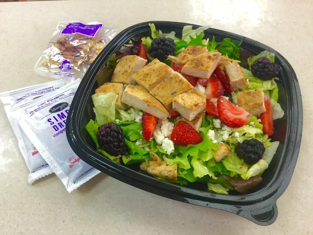 A bowl of Wendy's salad with croutons